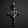 Rose gold plated 925 sterling silver crucifix pendant with INRI inscription on dark slate background