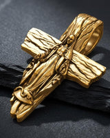 Front view of handcrafted Blessed Mother cross pendant showing intricate religious figure and wood grain design