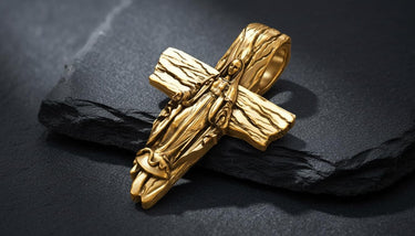Front view of handcrafted Blessed Mother cross pendant showing intricate religious figure and wood grain design