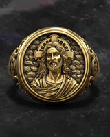 Close-up detail of handcrafted Christ face design with divine halo on premium 925 sterling silver religious ring