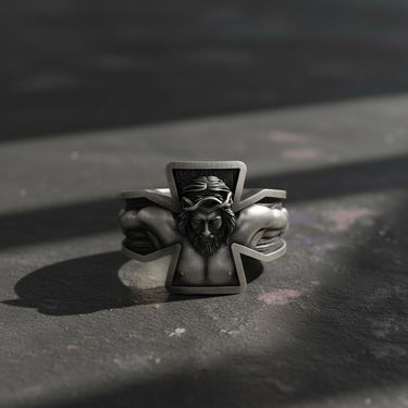 925 sterling silver crucifixion cross ring with detailed Jesus Christ carving on dark surface background
