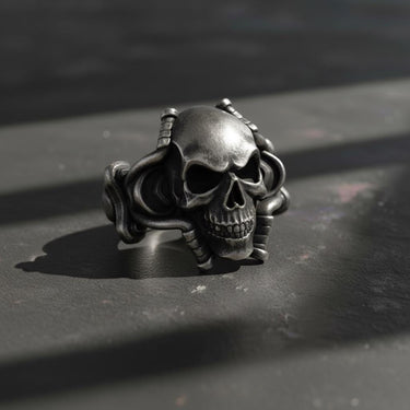 Side angle view of gothic skull ring with flowing octopus tentacles carved in premium sterling silver