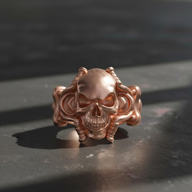 Rose gold version of handcrafted skull tentacle ring showing detailed tentacle wraparound band design