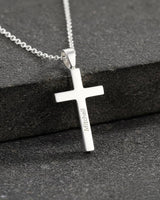 Sterling silver personalized cross necklace with 'Mitchell' engraved, showcasing the polished finish and classic design.