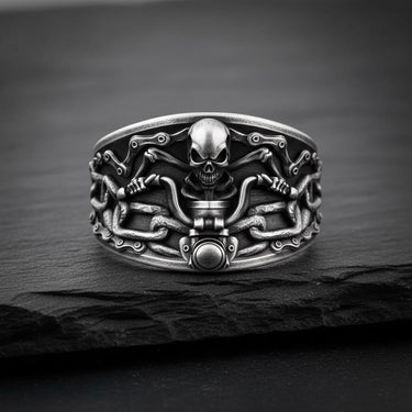 925 sterling silver skull chain ring with detailed motorcycle links displayed on dark slate background