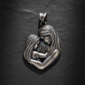 925 sterling silver mother child pendant showing tender embrace with flowing hair details on dark slate background