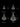 Size comparison chart for the Ace of Spades skull pendant, showing XS, S, M, and L options against an inch ruler.