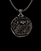 Silver Athena Owl Pendant on a chain, showing the detailed ancient Greek coin design with owl, olive branch, and ΑΘΕ letters.