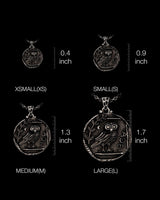 Size comparison chart for the Silver Athena Owl Pendant, displaying XS, S, M, and L options against a black background.