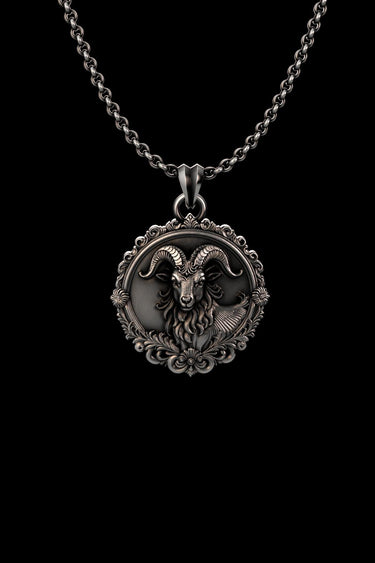 Front view of the handcrafted sterling silver ram pendant, highlighting the detailed facial features and vintage-style frame.