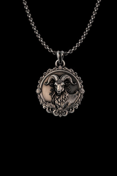 Silver Ram Pendant with oxidized finish, showing detailed horns and ornate filigree border on a sterling silver chain.