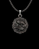 Silver Pisces Pendant with two koi fish in a yin-yang design, featuring an oxidized finish on a 925 sterling silver chain.