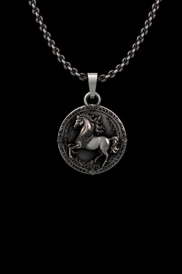 Angled view of the handcrafted silver horse pendant highlighting the oxidized finish and intricate 3D details of the design.