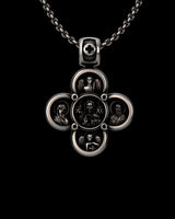 Silver Orthodox cross pendant featuring a central icon of Jesus Christ, flanked by Mary and John the Baptist on a chain.