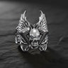 925 sterling silver skull engine ring with winged design displayed on dark wooden surface showing intricate details