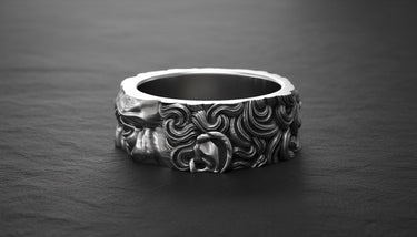 Close-up detail of Moses sculpture ring displaying craftsmanship and religious symbolism on sterling silver band