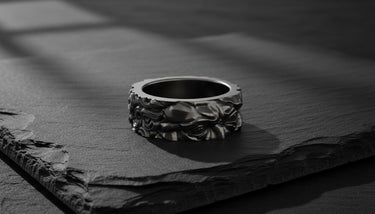 Side view of biblical Moses head ring showing intricate facial features and flowing beard detail in black rhodium