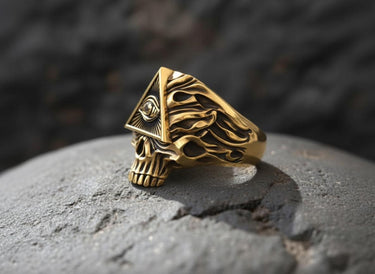 Side angle of handcrafted all seeing eye ring displaying skull texture and triangular mystic symbol detail