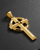 Gold vermeil Celtic cross pendant with geometric knotwork design on dark textured background showing fine detail