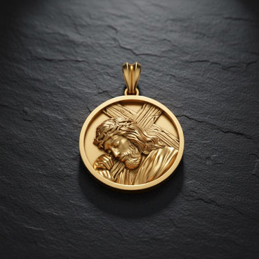 Close-up of handcrafted Jesus bearing cross pendant with oxidized finish highlighting sacred religious design