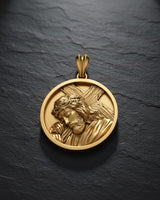 Gold vermeil Jesus cross medallion pendant showing intricate crown of thorns and robes craftsmanship detail