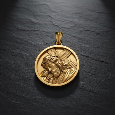 Gold vermeil Jesus cross medallion pendant showing intricate crown of thorns and robes craftsmanship detail