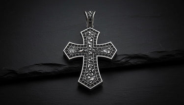 Detailed view of engraved floral patterns on Templar knight cross pendant showing rose gold finish quality