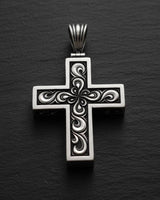 925 sterling silver cross pendant with intricate baroque filigree openwork design on dark textured background