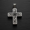 925 sterling silver cross pendant with intricate baroque filigree openwork design on dark textured background