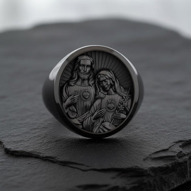 Sterling silver Catholic ring with Sacred Hearts design featuring sunburst pattern on dark background