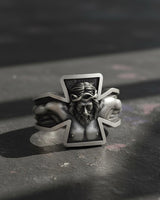 Side angle view of handcrafted Jesus cross ring displaying oxidized finish and premium sterling silver band
