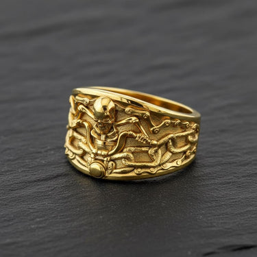 Side angle view of biker skull chain ring highlighting dimensional skull centerpiece and band thickness