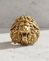 Close-up of the King of the Beasts lion ring, showcasing the handcrafted artistry in the flowing mane and fierce jaw.