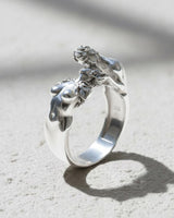 Artistic Silver Lovers Kiss Ring from a three-quarter view, revealing the oxidized finish and the 925 stamp inside.
