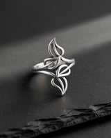 Polished 925 sterling Silver Leaf Ring showcasing its elegant, flowing botanical design against a black slate background.