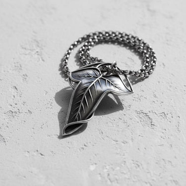 Close-up of the sterling silver Elvish Leaf Pendant, showcasing the artisanal quality and antique finish of the piece.