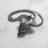 Handcrafted Elvish Leaf Pendant in 925 sterling silver with oxidized details, shown on a textured light gray surface.