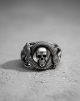 Front view of handcrafted 925 sterling silver snake skull ring showing detailed scales and realistic skull design
