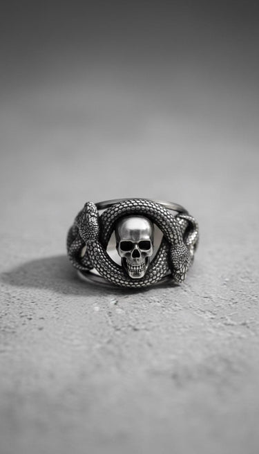 Front view of handcrafted 925 sterling silver snake skull ring showing detailed scales and realistic skull design