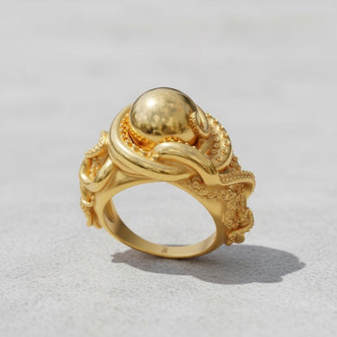 Gold-plated version of the artisan octopus ring, showcasing the same detailed tentacle design with a polished gold finish.