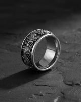 Angled view of the handcrafted 925 sterling silver phoenix ring, highlighting the intricate feather and flame details.