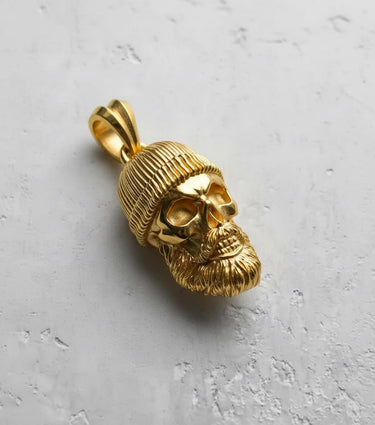 Gold-plated version of the bearded skull pendant, featuring the same intricate mariner beanie and textured beard design.