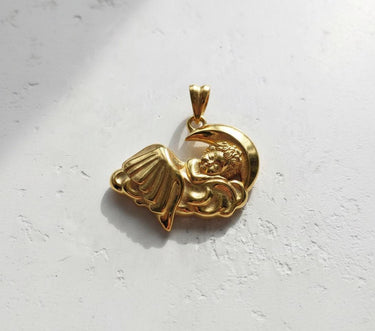 Gold-plated version of the sleeping angel pendant, highlighting the polished finish and celestial design from an angle.