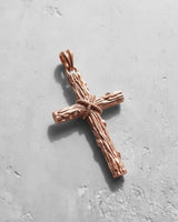 Rose gold plated Silver Wood Cross Pendant showcasing its warm finish and rugged, nature-inspired design details.