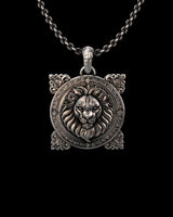Angled view of the handcrafted 925 sterling silver lion pendant, highlighting the oxidized finish and intricate relief details.