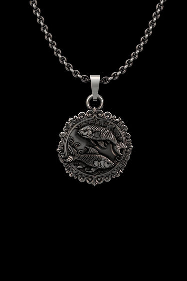 Detailed close-up of the handcrafted sterling silver Pisces pendant, showcasing the ornate border and intricate fish scales.