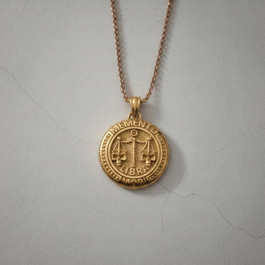 Gold-plated version of the Libra Skull Pendant, highlighting the intricate details of the scales and gothic design.