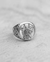 Angled view of the 925 sterling silver Cthulhu ring, highlighting the ornate swirling patterns etched into the sides of the band.