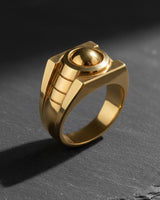 Angled view of the gold-plated version of the Silver Lantern Ring, highlighting the band's carved lines and bold shape.