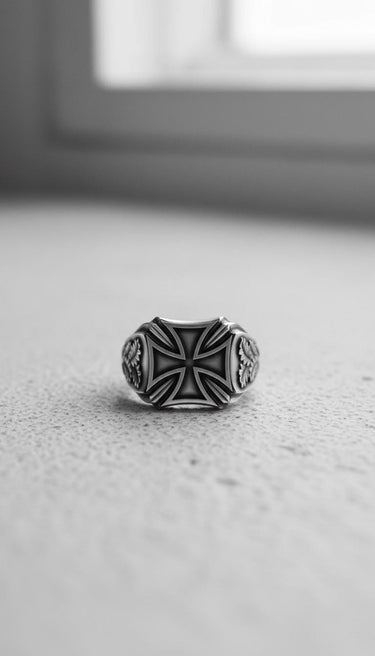 Front view of a 925 sterling silver Iron Cross ring, highlighting the bold, symmetrical design and dark oxidized background.